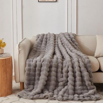 Wonderfully soft, stylish throw that brings warmth, coziness, and elegance together.