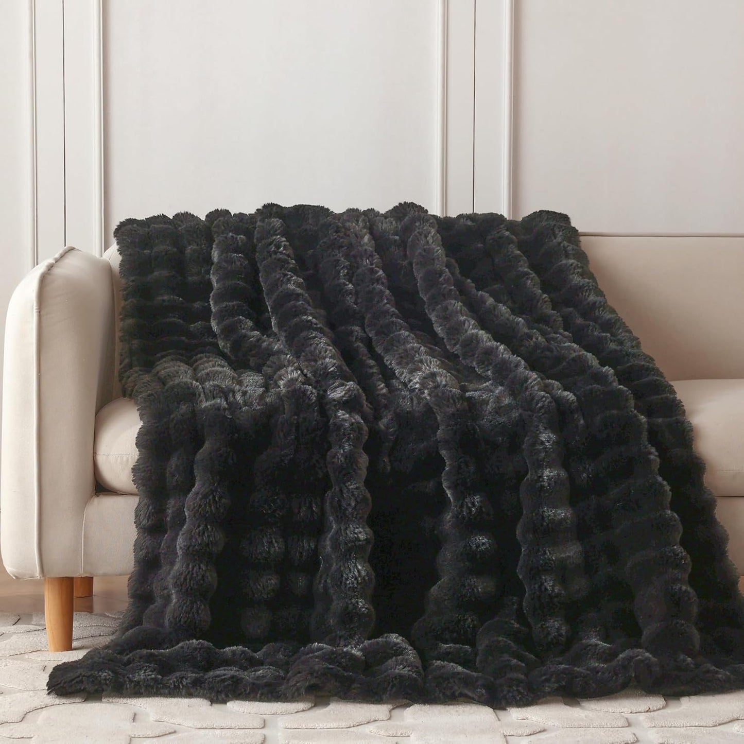 Wonderfully soft, stylish throw that brings warmth, coziness, and elegance together.