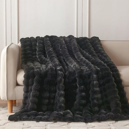 Wonderfully soft, stylish throw that brings warmth, coziness, and elegance together.