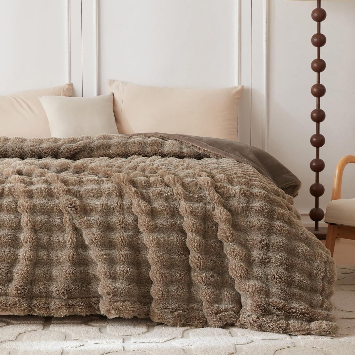 Wonderfully soft, stylish throw that brings warmth, coziness, and elegance together.