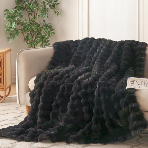 Wonderfully soft, stylish throw that brings warmth, coziness, and elegance together.