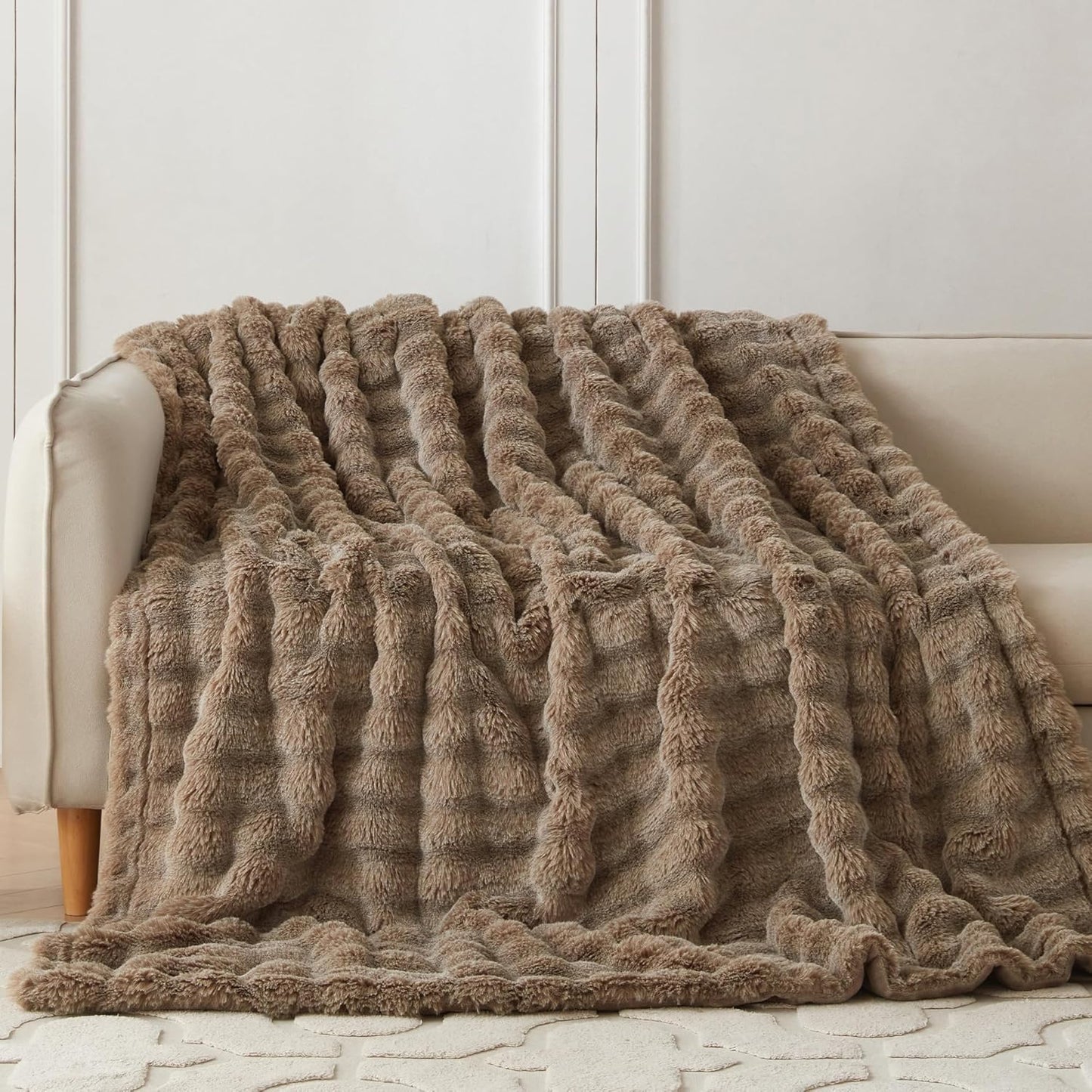 Wonderfully soft, stylish throw that brings warmth, coziness, and elegance together.