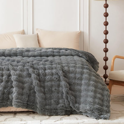 Wonderfully soft, stylish throw that brings warmth, coziness, and elegance together.