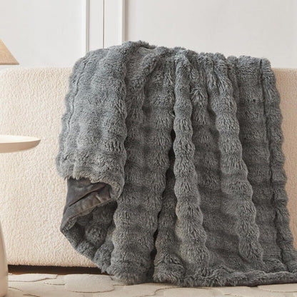 Wonderfully soft, stylish throw that brings warmth, coziness, and elegance together.