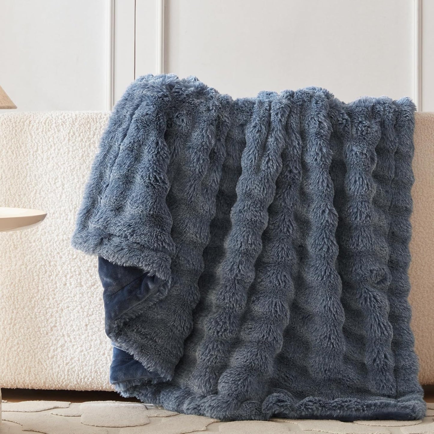 Wonderfully soft, stylish throw that brings warmth, coziness, and elegance together.