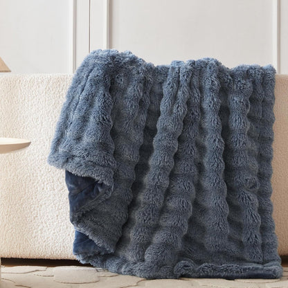 Wonderfully soft, stylish throw that brings warmth, coziness, and elegance together.