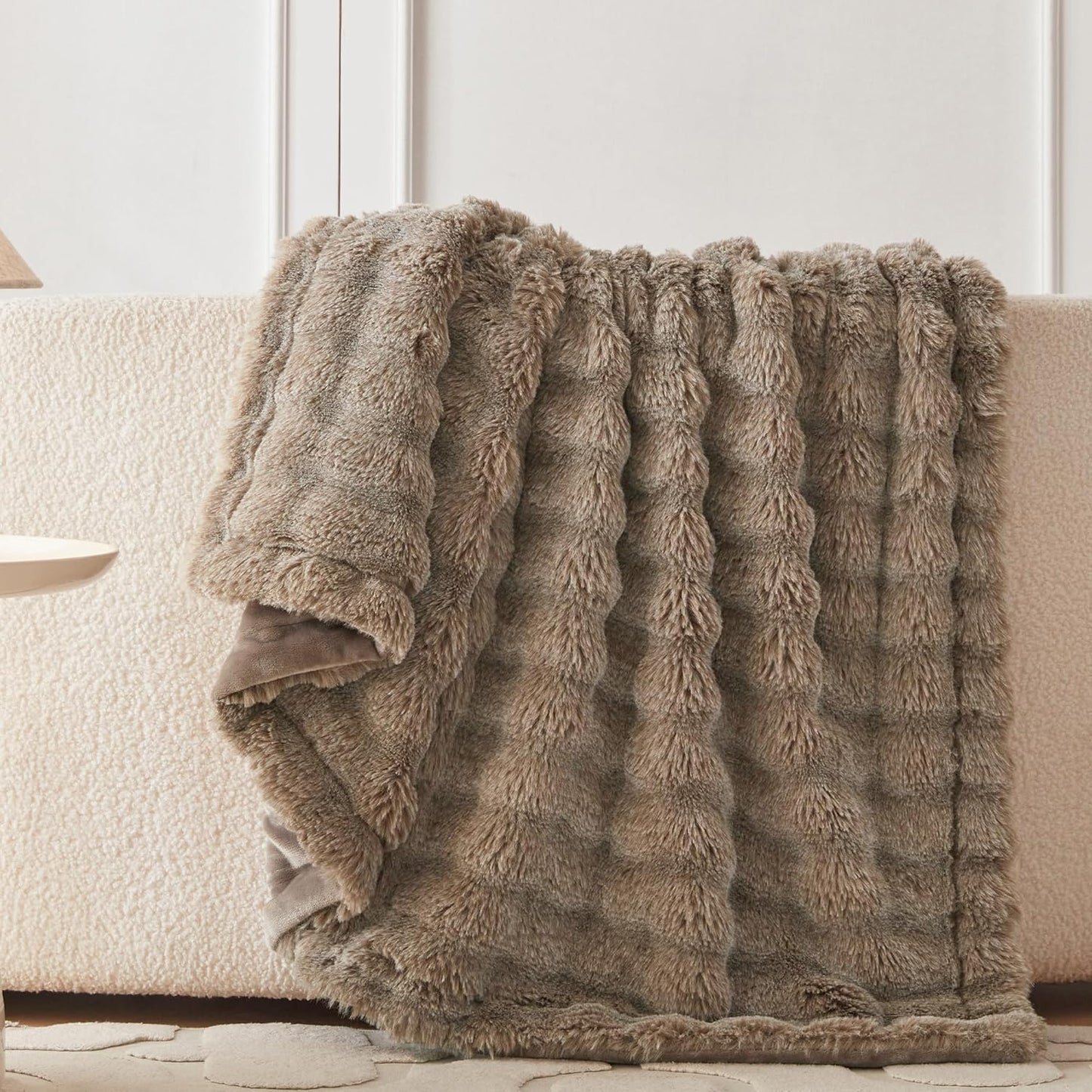 Wonderfully soft, stylish throw that brings warmth, coziness, and elegance together.